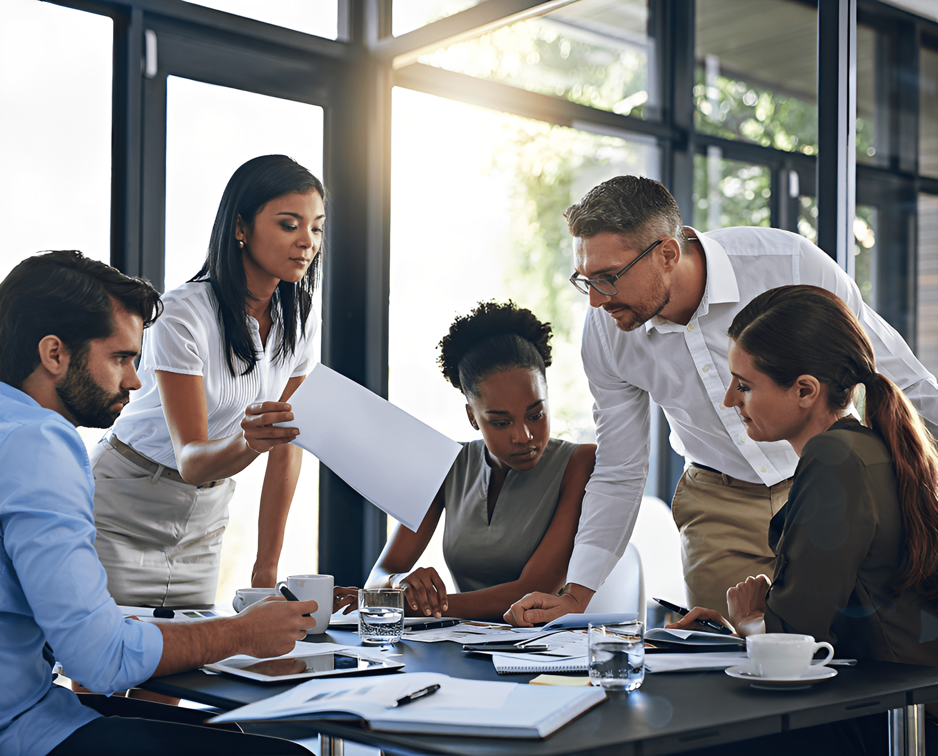 Team collaborating around a conference table.
